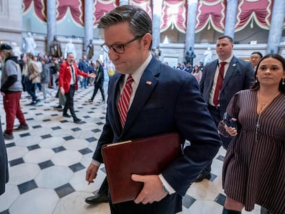 Speaker of the House Mike Johnson (C) walks through Statuary Hall to the House floor to vote on the USD 1.2 trillion funding package in the US Capitol in Washington, DC, USA, 22 March 2024.