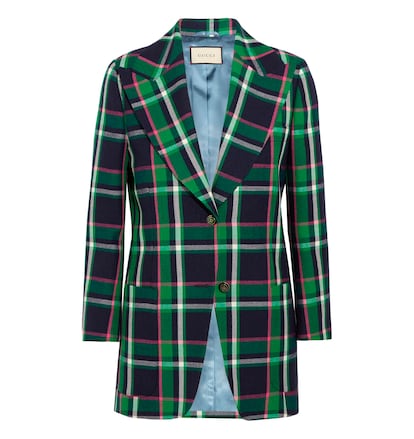 Americana de cuadros verdes de Gucci disponible en Net a porter (c.p.v.).