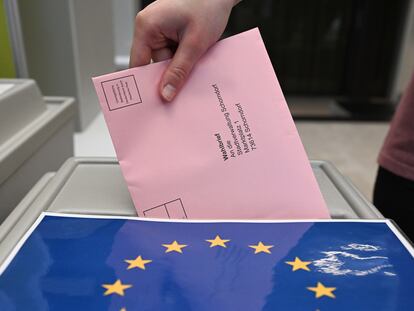 31 May 2024, Baden-Württemberg, Schorndorf: A ballot letter with a ballot paper for the European elections is placed in a ballot box at a polling station in the town hall for postal voting. Photo: Bernd Weißbrod/dpa (Photo by Bernd Weißbrod/picture alliance via Getty Images)
