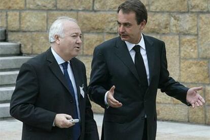 José Luis Rodríguez Zapatero y Miguel Ángel Moratinos, el 24 de marzo en Madrid.