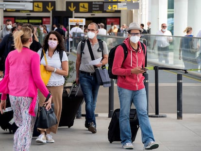 Travelers arriving at Palma airport last month.