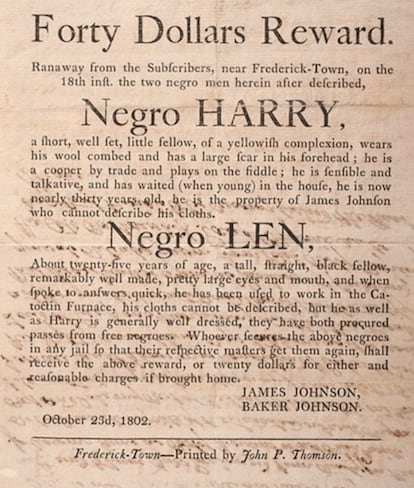 A newspaper advertisement offering a reward for the apprehension of two escaped slaves. 