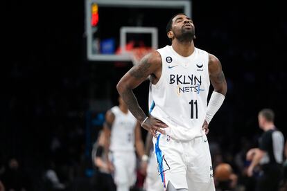 Brooklyn Nets' Kyrie Irving reacts during the second half of the team's NBA basketball game against the Detroit Pistons Thursday, Jan. 26, 2023 in New York.