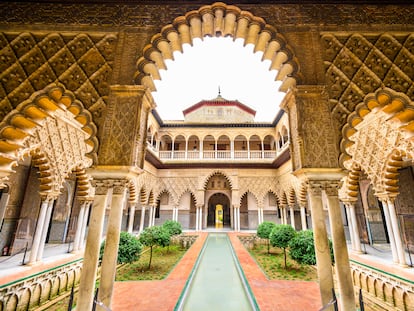 Seville, Spain - November 7, 2014: The Royal Alcazar of Seville at the Courtyard of the Maidens. It is the oldest royal palace still in use in Europe.