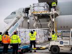 FILE PHOTO: Workers unload a shipment of Chinese company Sinopharm's coronavirus disease (COVID-19) vaccine as it arrives at Budapest Airport, Hungary, February 16, 2021. Ministry of Foreign Affairs and Trade (KKM)/Handout via REUTERS   THIS IMAGE HAS BEEN SUPPLIED BY A THIRD PARTY./File Photo