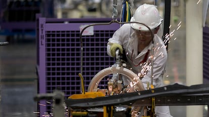 An employee at work in the new multibillion-dollar Honda car plant in Celaya, in the central Mexican state of Guanajuato, Friday, Feb. 21, 2014