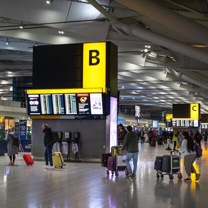 Information boards and zone markers in the check in area in the departures hall at Heathrow Airport Terminal Five in London UK. (Photo by: Andy Soloman/UCG/Universal Images Group via Getty Images)