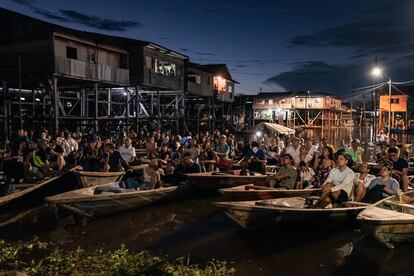 People watch a screening in the Belén neighborhood in Iquitos.