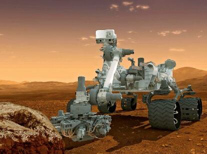Recreación artística del robot ‘Curiosity’ en acción en el planeta rojo.