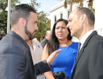 Michael (left) and Tanya Ibar, brother and wife of Pablo Ibar, speak with his lawyer in 2014.