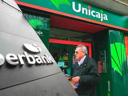 Logotipos superpuestos de Unicaja y Liberbank 