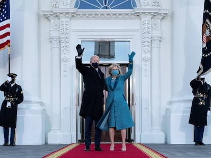 U.S. President Joe Biden and first lady Jill Biden wave as they arrive at the North Portico of the White House in Washington, DC, U.S. January 20, 2021. Alex Brandon/Pool via REUTERS