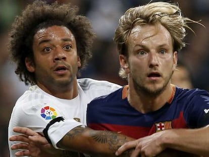 Los jugadores de Real Madrid y Barcelona, Marcelo e Ivan Rakitic, en el cl&aacute;sico disputado en el Santiago Bernab&eacute;u esta temporada