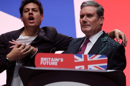 A protester throws glitter at Britain's Labour Party Leader Keir Starmer at Britain's Labour Party annual conference in Liverpool, Britain, October 10, 2023.