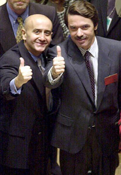 Richard Grasso, junto a José María Aznar, en Wall Street en noviembre de 2001.