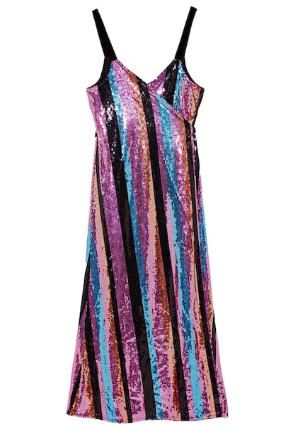 Pon el punto de color a la noche con este diseño midi repleto de lentejuelas y rayas de colores de Zara (59,95 euros).