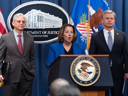 Deputy Attorney General Lisa Monaco flanked by Attorney General Merrick Garland, left, and Federal Bureau of Investigation (FBI) Director Christopher Wray speaks during a news conference to announce an international ransomware enforcement action, at the Department of Justice in Washington, Thursday, Jan. 26, 2023.