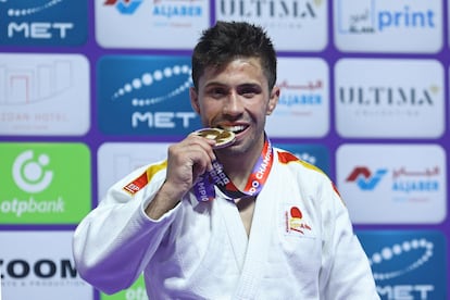Fran Garrigós, en Doha, con el oro mundial.