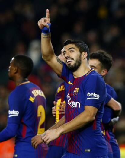 Luis Su&aacute;rez celebra uno de sus tres goles ante el Girona. 