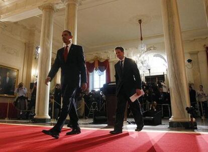 Obama y Geithner, tras anunciar ayer la reforma fiscal.