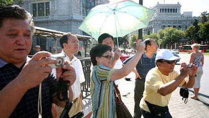 A group of Asian tourists in Madrid.