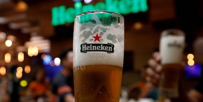 FILE PHOTO: Glasses of Heineken beer are seen at a restaurant in Hanoi