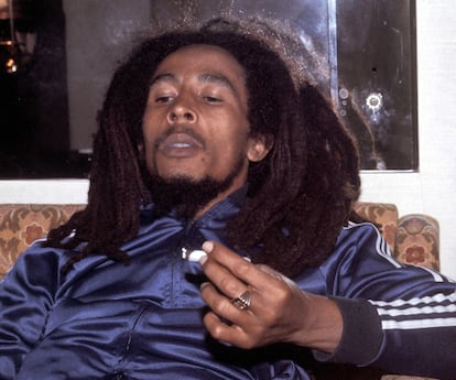 A 1976 photograph of Bob Marley smoking at the Plaza Hotel in New York.