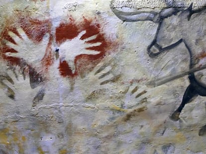 Painted hands in the cave of Altamira.