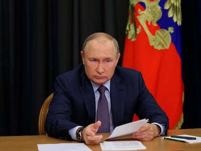 Russian President Vladimir Putin gestures as he attends a meeting on agricultural issues via videoconference in the Bocharov Ruchei residence in the Black Sea resort of Sochi, Russia, Tuesday, Sept. 27, 2022. (Gavriil Grigorov, Sputnik, Kremlin Pool Photo via AP)