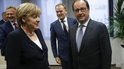 Angela Merkel, François Hollande, y el presidente del Consejo Europeo, Donald Tusk en la cumbre del pasado 7 de julio