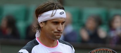 Spain's David Ferrer reacts after beating Spain's Marcel Granollers during their Men's Singles 4th Round tennis match of the French Open.