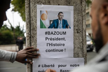 Demonstrators gather in front of the Embassy of Niger in Paris, in support of Nigerien President Mohamed Bazoum and ECOWAS, Saturday, Aug. 5, 2023