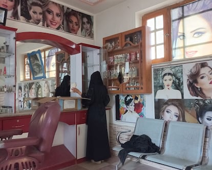 An Afghan beautician packs her stuff on the last day of the deadline issued by the Taliban authorities to close down beauty salons, in Mazar-e-Sharif, Afghanistan, 25 July 2023