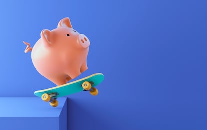 Pink piggy bank on a skateboard