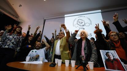Miguel and Julio Santucho raise their fists next to Estela de Carlotto, president of the human rights organization Abuelas de Plaza de Mayo (Grandmothers of Plaza de Mayo), after announcing that their relative, who was taken away during the 1976-1983 Argentine dictatorship, was found and will recover his real identity becoming the 133rd person to do so, at the former Naval Mechanics School building, which functioned as a clandestine detention center, also known as ESMA, in Buenos Aires, Argentina July 28, 2023. REUTERS/Agustin Marcarian