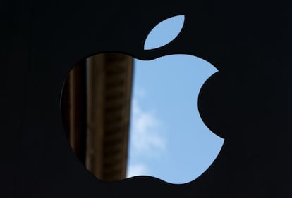 The Apple Inc logo sits on display outside the company's store in Amsterdam, the Netherlands.