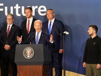 Prime Minister Sir Keir Starmer (left) and Ukrainian President Volodymyr Zelenskiy (right) look on as US President Joe Biden speaks, where he introduced Ukrainian president Volodymyr Zelenskiy as "President Putin" during the closing ceremony, at the Nato 75th anniversary summit at the Walter E. Washington Convention Center, in Washington DC, US. Picture date: Thursday July 11, 2024. Stefan Rousseau/Pool via REUTERS