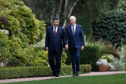 President Joe Biden and Chinese President Xi Jinping walk together after a meeting during the Asia-Pacific Economic Cooperation (APEC) Leaders' week in Woodside, California, on November 15, 2023.