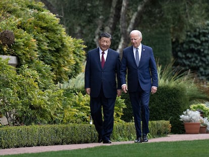 President Joe Biden and Chinese President Xi Jinping walk together after a meeting during the Asia-Pacific Economic Cooperation (APEC) Leaders' week in Woodside, California, on November 15, 2023.