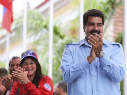 Nicolas Maduro e sua mulher, Cilia Flores, no domingo