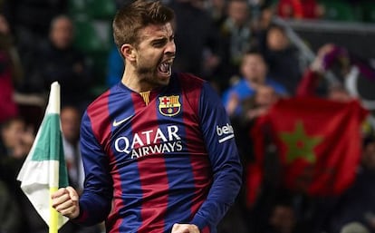 Piqué celebra el primer gol del Barça.