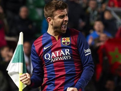 Piqué celebra el primer gol del Barça.