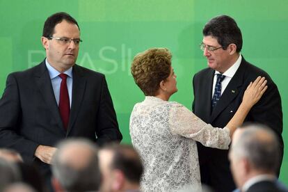 Dilma entre Barbosa e Levy.