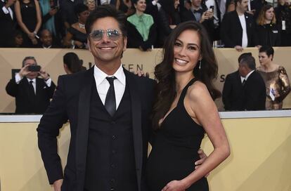 John Stamos y su ya esposa Caitlin McHugh.