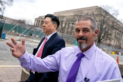 Kevin Seefried, right, a Delaware man who stormed the Capitol with Confederate battle flag, departs Federal Court after sentencing, Thursday, Feb. 9, 2023, in Washington, with his public defender Eugene Ohm.