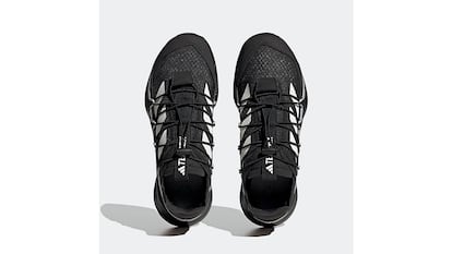 Adidas hiking shoes on a white background.