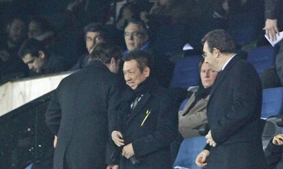 Peter Lim, en el centro, en un partido Atlético-Valencia de la Copa del Rey.