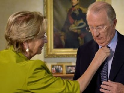 El rey Alberto II y su esposa, la reina Paola, antes de su discurso