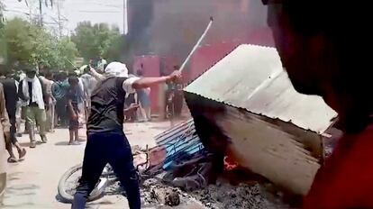 Furniture and other belongings of a church are set on fire, in Jaranwala, Pakistan, on August 16, 2023.