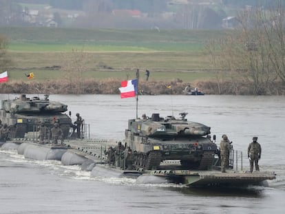 Polish troops and other NATO personnel participate in military maneuvers in Korzeniewo, Poland, on March 4, 2024.